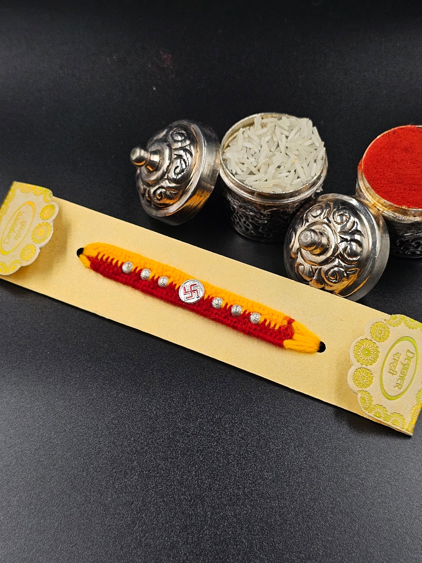 Silver Swastika Coin with silver balss in side - Rakhi