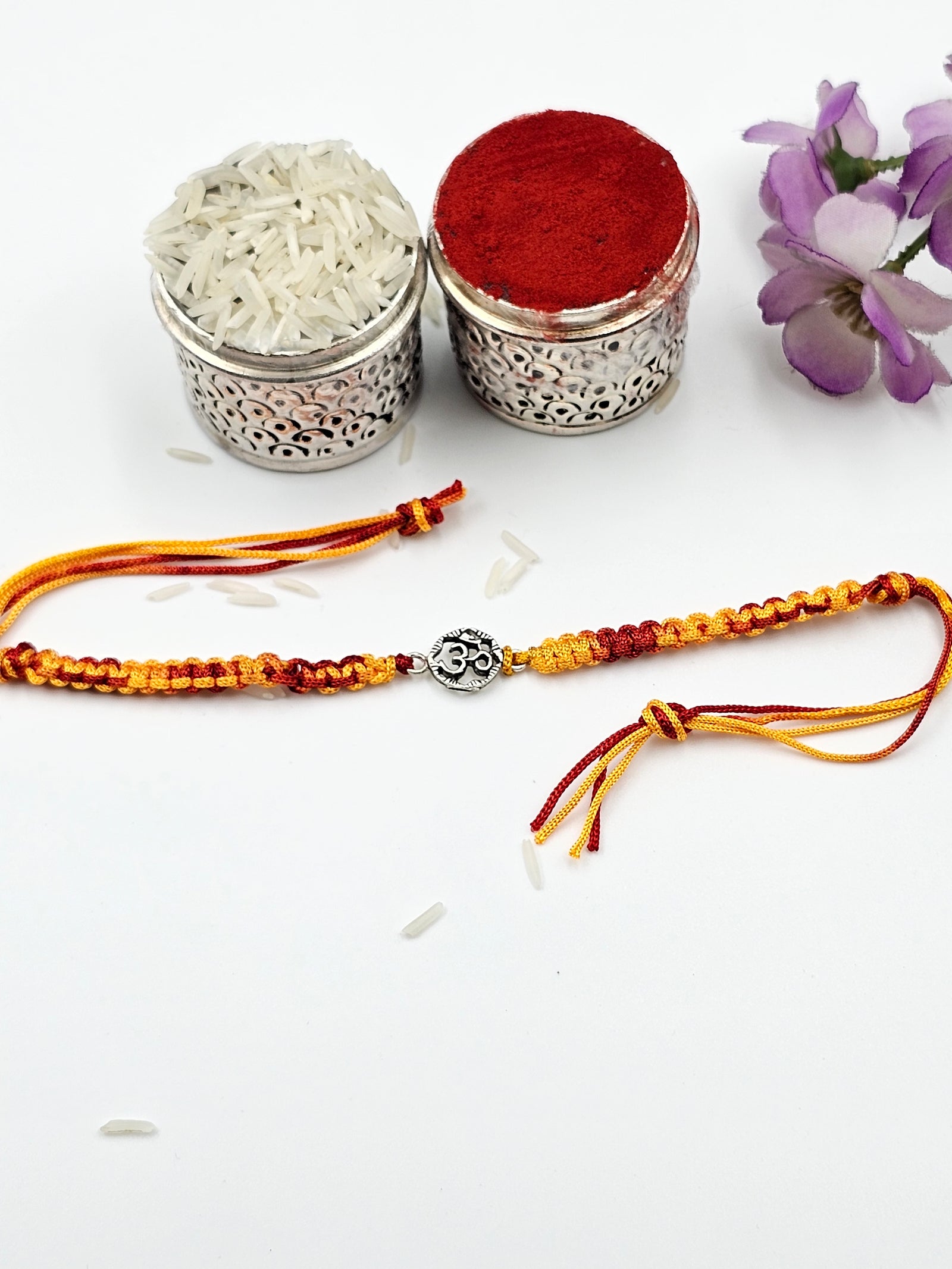 Om Silver Rakhi