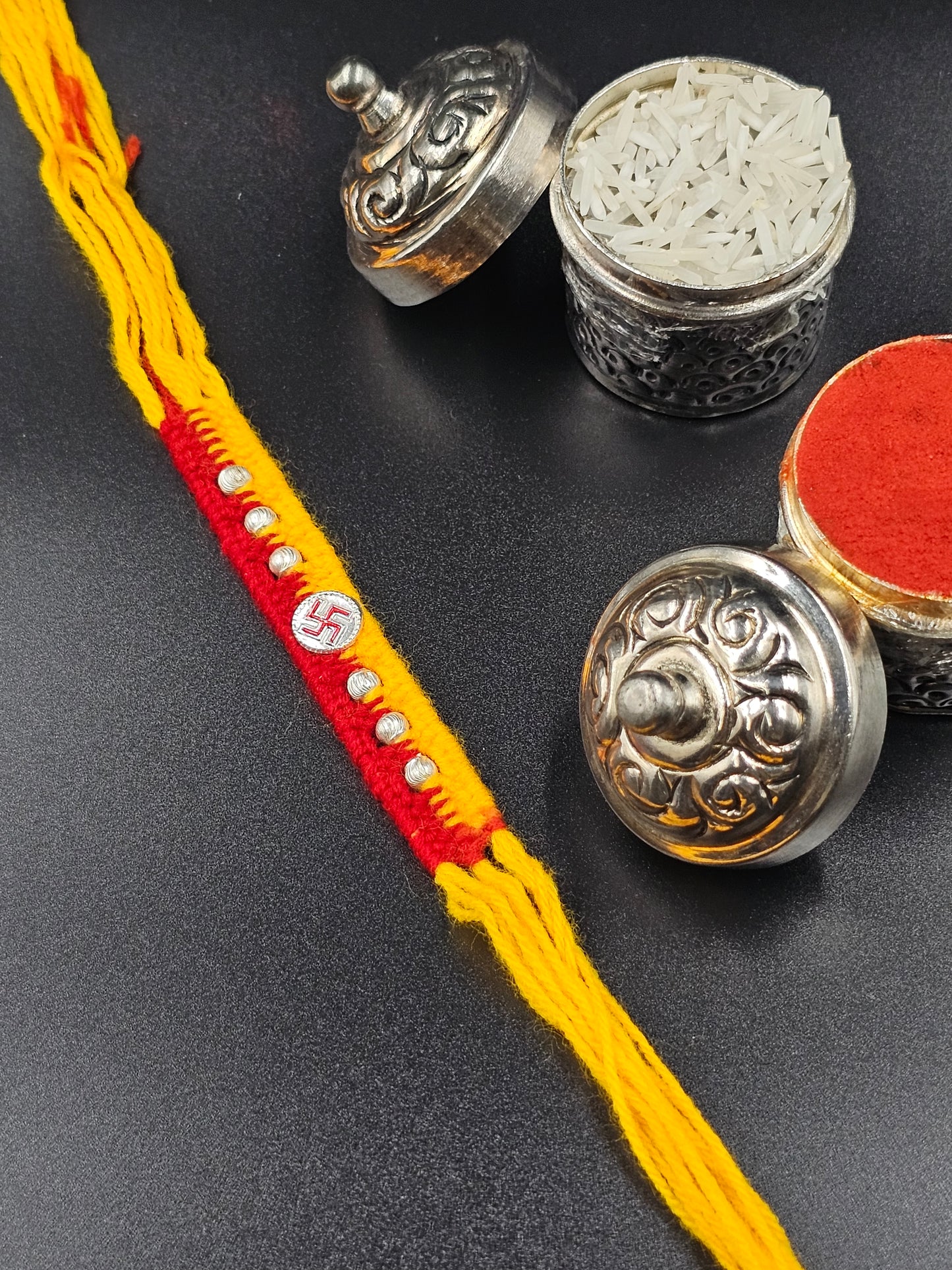 Silver Swastika Coin with silver balss in side - Rakhi